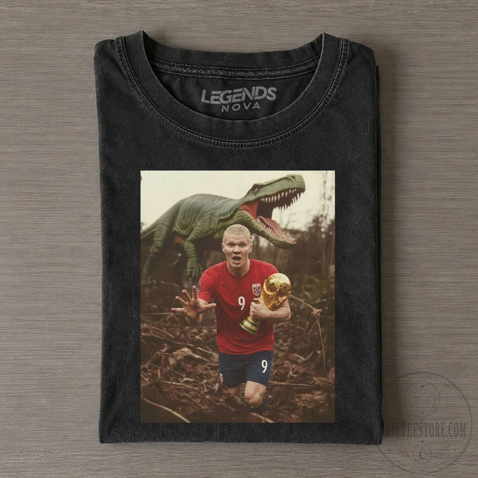 Graphic T-Shirt Featuring Funny Dinosaur Chasing Footballer Erling Haaland